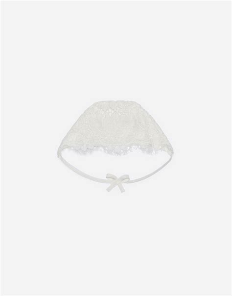 Galloon lace bonnet in White .